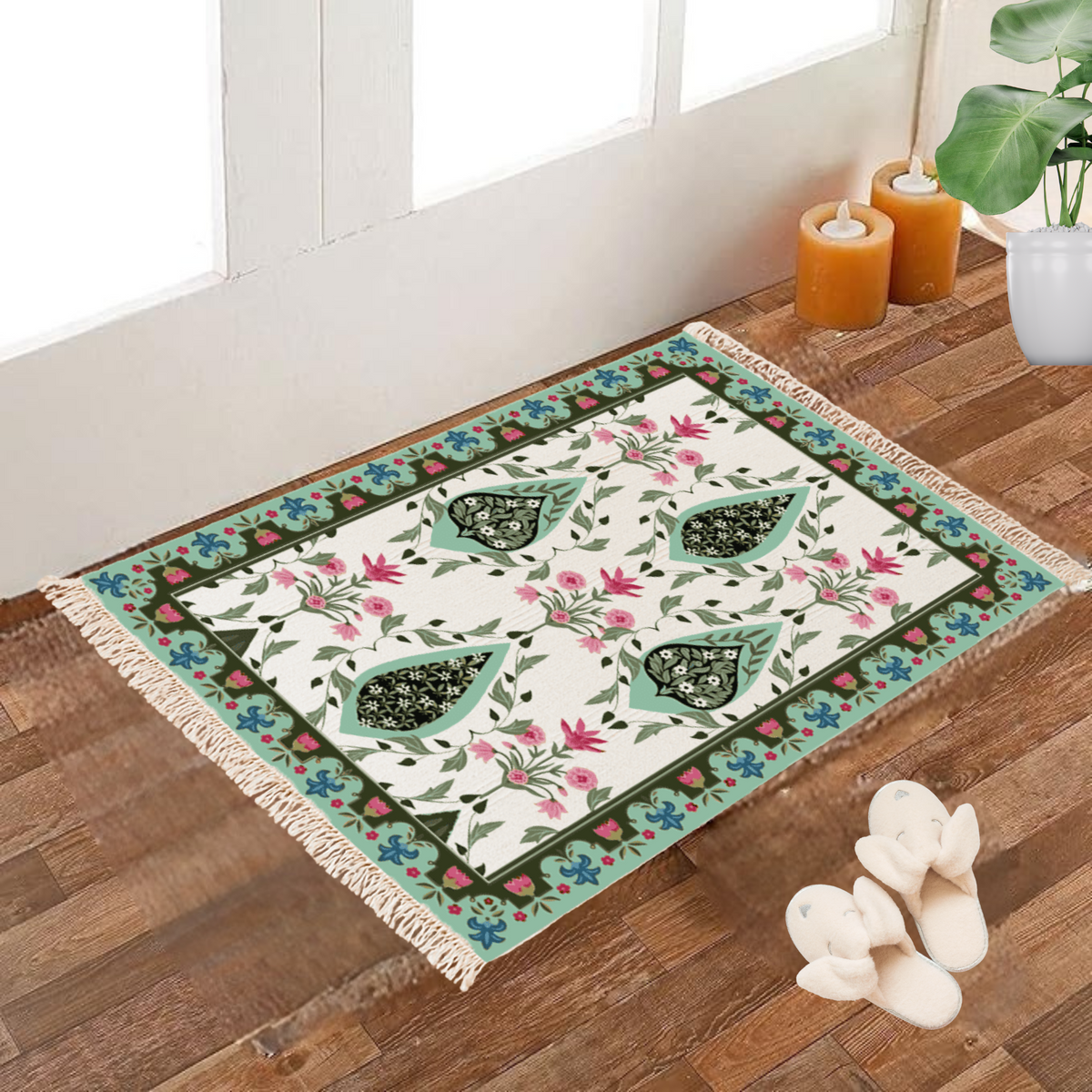Cream Dhurrie rug with a green paisley medallion and pink/blue floral border, poly silk, 2x3 feet