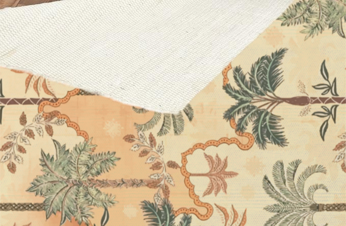 Close-up of a folded-back corner showing the woven texture and underside of the tropical palm tree Dhurrie rug