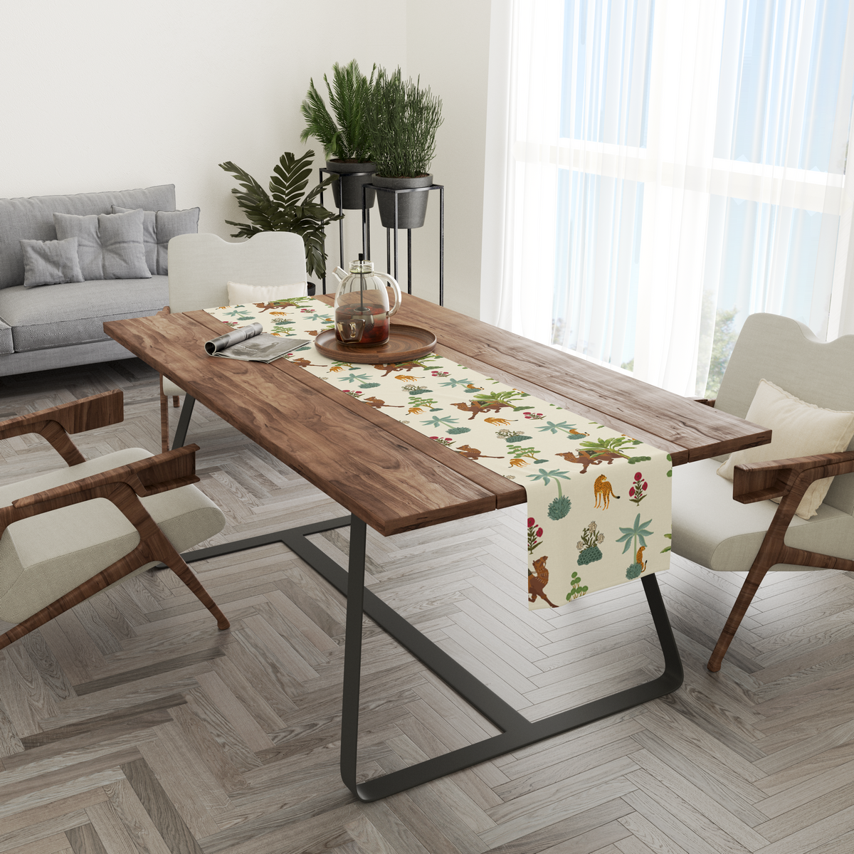 Cream table runner with camel, leopard, and palm-tree motifs, styled in a living and dining room setting