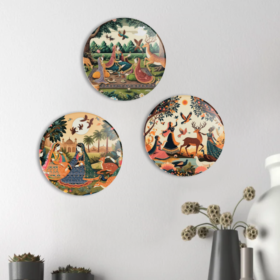 Set of 3 round MDF wall plates with Mughal-style peacock, deer, and garden scenes in earth tones
