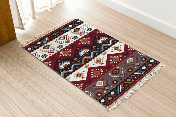 Angled view of the southwestern geometric diamond Dhurrie rug on a wood floor near a curtained doorway