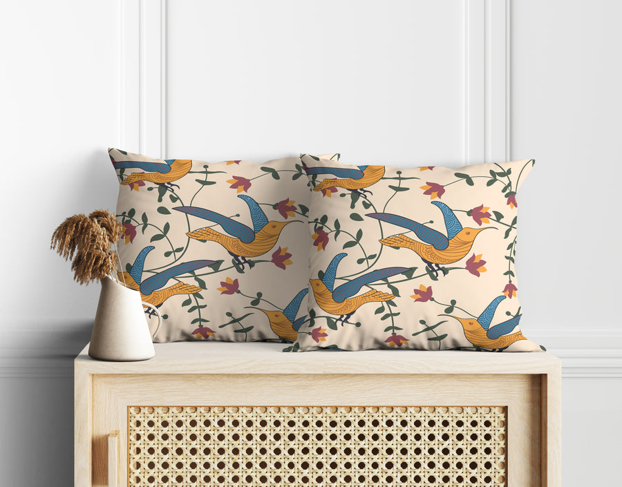 Cotton cushion cover set of 2 with a folk-art blue and orange bird motif, 100% cotton, styled on a console table