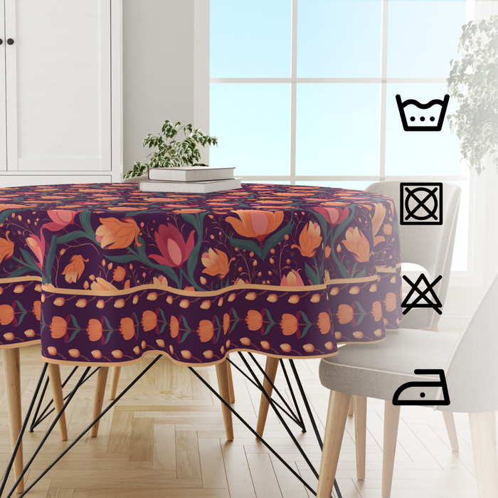 Budding Lotus round tablecloth on a 4 seater dining table, with fabric care wash, bleach, tumble dry and iron symbols
