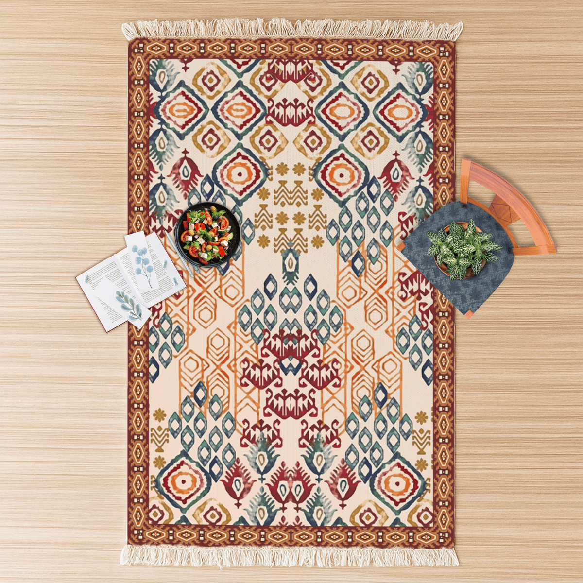 Overhead flat lay of the ikat diamond Dhurrie rug with a snack bowl and a small houseplant on top