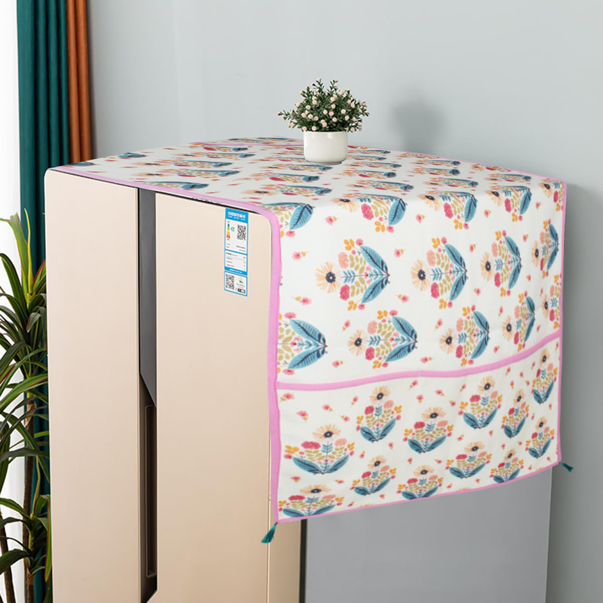 Cotton fridge cover with a blue and pink floral bouquet print, draped over a refrigerator