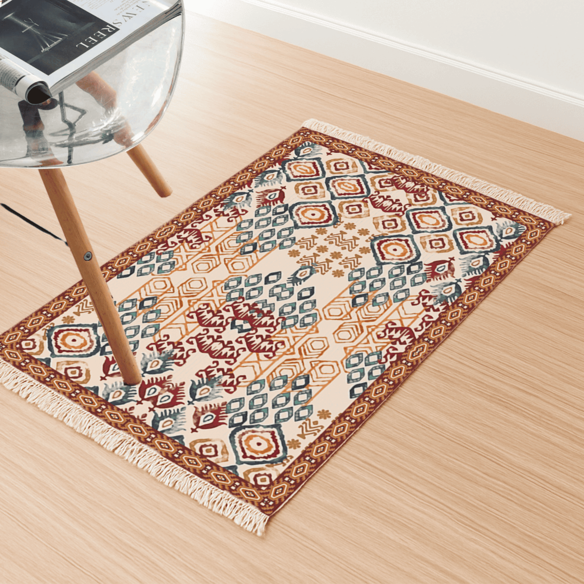 Angled view of the ikat diamond Dhurrie rug on a light wood floor beside a chair