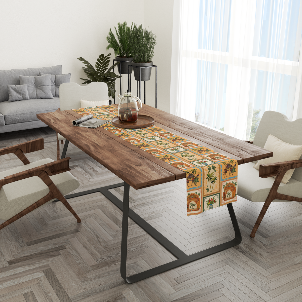 Checkered table runner with camel, palm-tree, jharokha-window, and floral vase motifs, styled in a living and dining room setting